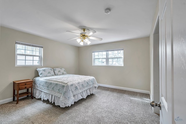 2611 Fannin Ave, Midland, TX 79705 - carpeted bedroom with baseboards and ceiling fan
