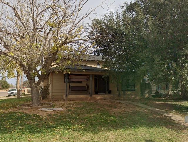 510 N Terrell St, Midland, TX 79701 - view of front of property featuring a front lawn