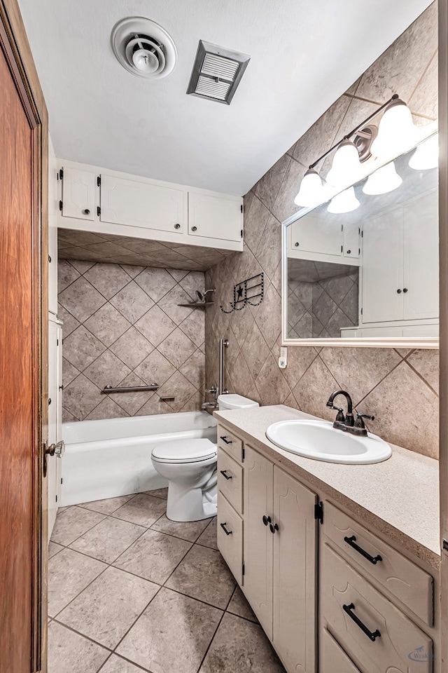 full bathroom featuring  shower combination, tile patterned flooring, backsplash, vanity, and toilet