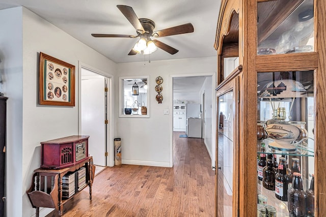 hall featuring hardwood / wood-style flooring