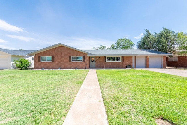 2403 Terrace Ave, Midland, TX 79705 - ranch-style home with a garage, brick siding, concrete driveway, and a front yard