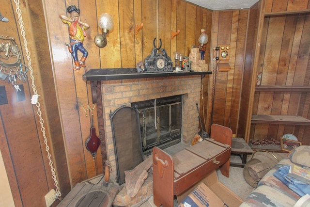 interior space featuring wood walls and a fireplace