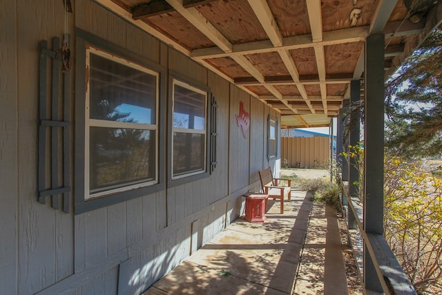 view of home's exterior with fence