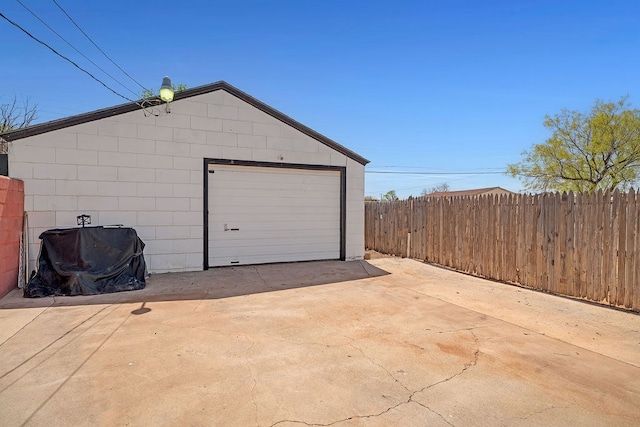 detached garage with fence
