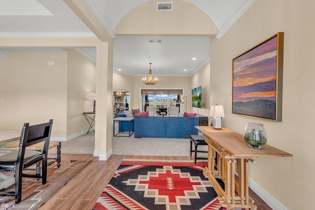 131 High Lonesome Dr, Alpine, TX 79830 - entrance foyer featuring wood finished floors, baseboards, a chandelier, and crown molding