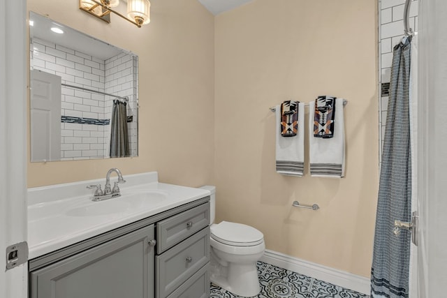 131 High Lonesome Dr, Alpine, TX 79830 - bathroom featuring vanity, toilet, baseboards, tile patterned floors, and curtained shower