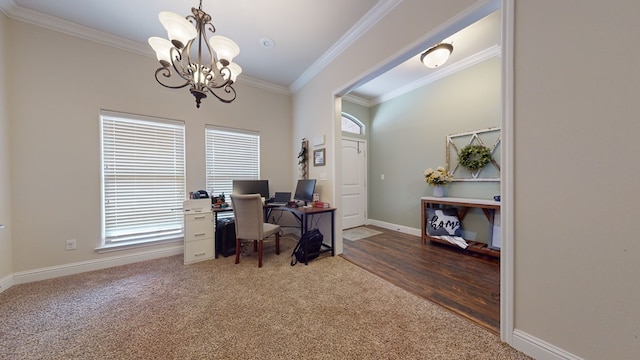 office space with a notable chandelier, ornamental molding, wood finished floors, and baseboards