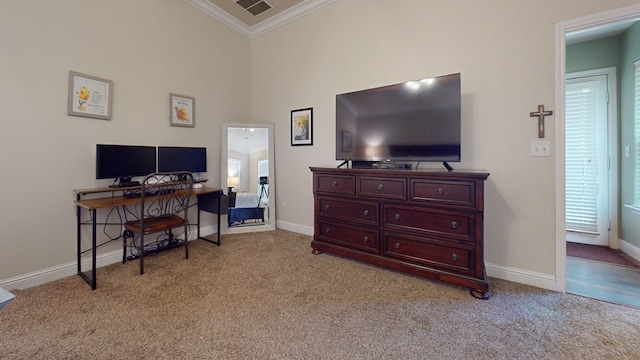 office space featuring light carpet, ornamental molding, and baseboards