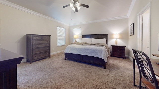 bedroom featuring ceiling fan, light carpet, baseboards, vaulted ceiling, and crown molding