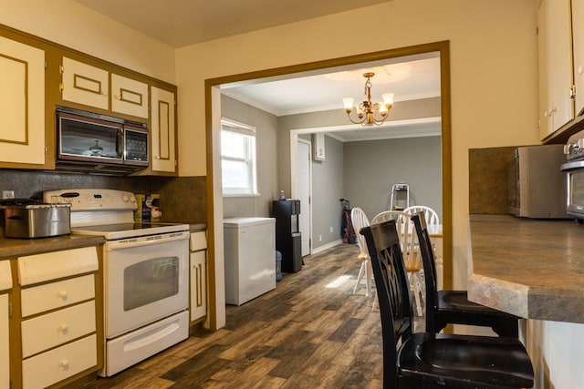 kitchen with white range with electric stovetop, dark wood finished floors, refrigerator, black microwave, and a notable chandelier