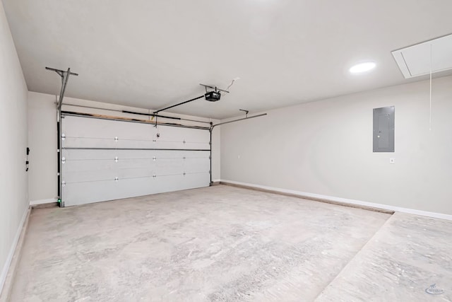 garage featuring a garage door opener and electric panel