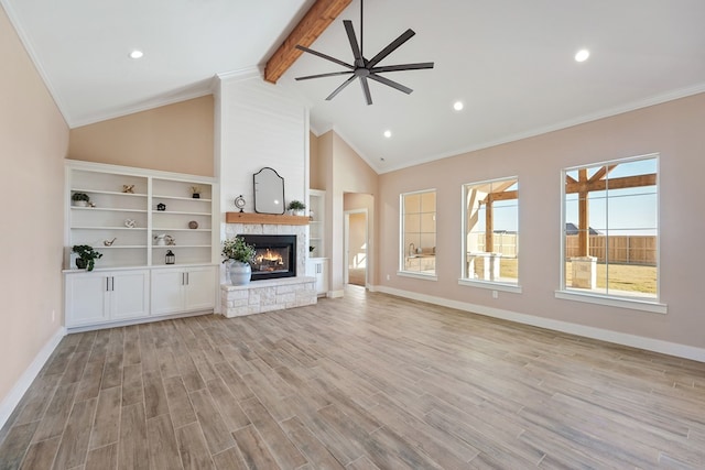 unfurnished living room with beam ceiling, ceiling fan, and light hardwood / wood-style flooring