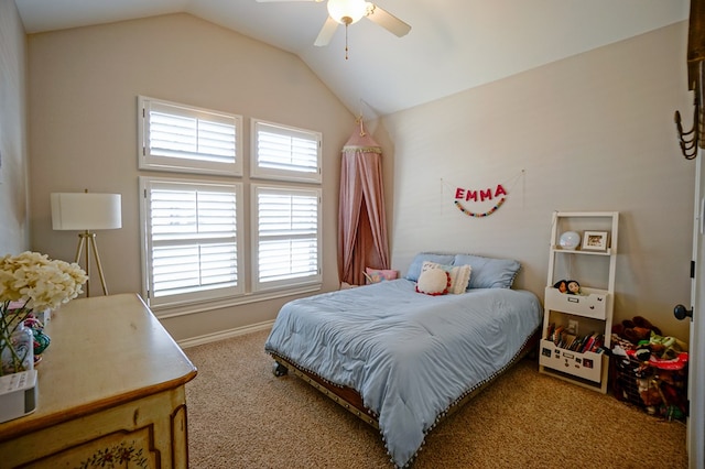 carpeted bedroom featuring vaulted ceiling and a ceiling fan