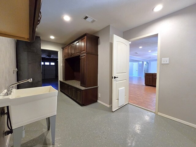 interior space with visible vents, recessed lighting, and baseboards