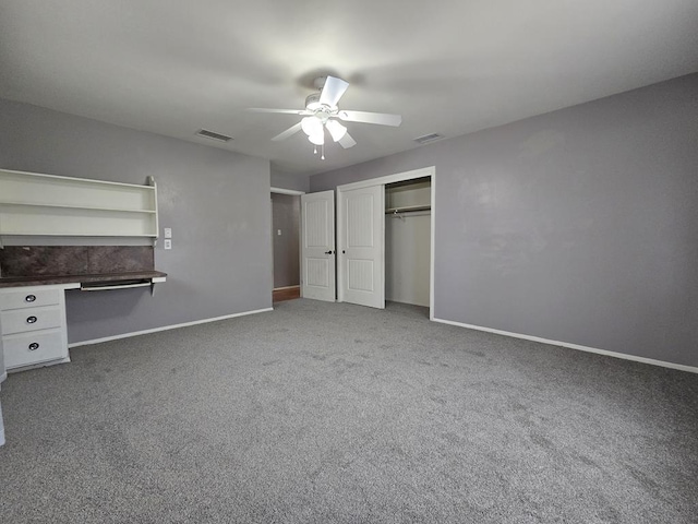 unfurnished bedroom with baseboards, visible vents, ceiling fan, a closet, and carpet flooring