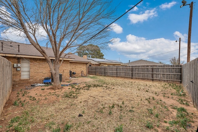 view of yard featuring a fenced backyard