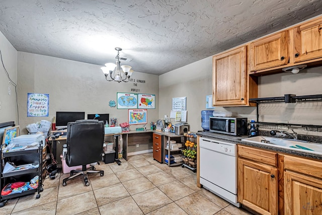 interior space with dark countertops, stainless steel microwave, white dishwasher, a notable chandelier, and a sink