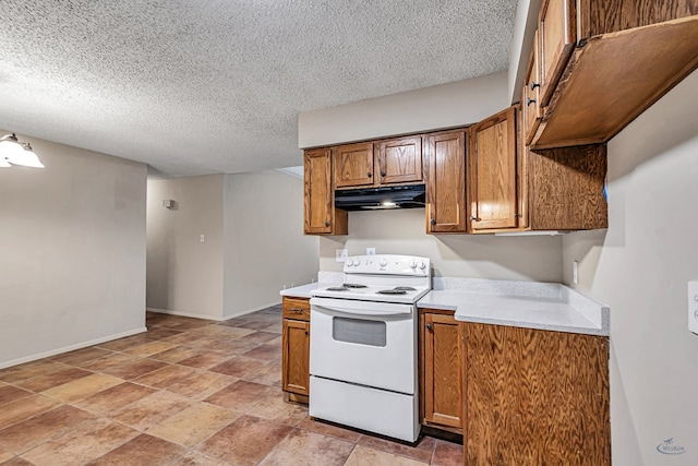 kitchen featuring baseboards, under cabinet range hood, light countertops, brown cabinets, and white electric stove