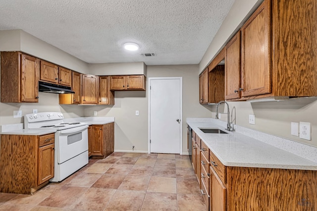 kitchen featuring visible vents, brown cabinets, white range with electric cooktop, under cabinet range hood, and a sink