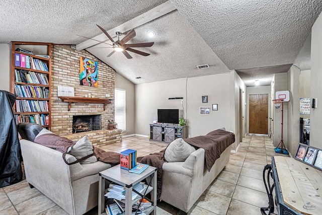 living area featuring a brick fireplace, lofted ceiling with beams, light tile patterned floors, a textured ceiling, and a ceiling fan