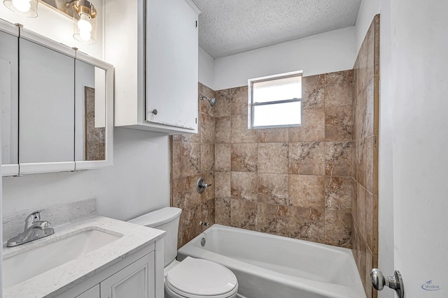 full bathroom featuring shower / bathing tub combination, a textured ceiling, vanity, and toilet