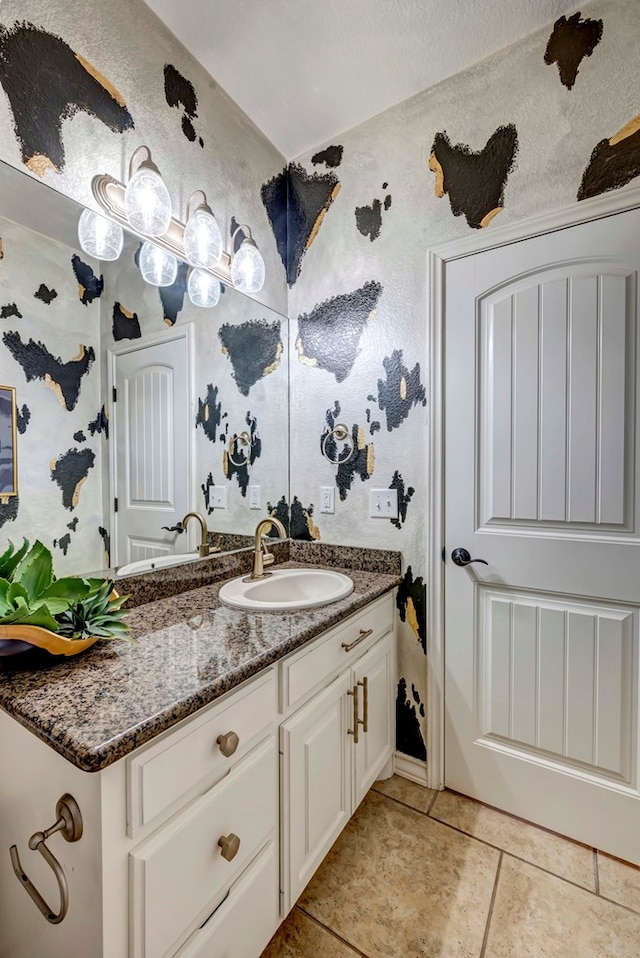 10104 E County Rd 103, Midland, TX 79706 - bathroom with vanity and tile patterned flooring