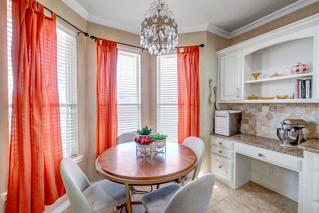 10104 E County Rd 103, Midland, TX 79706 - dining room featuring a chandelier, built in study area, light tile patterned flooring, and crown molding