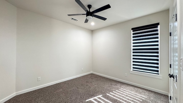 13223 E County Rd 110, Midland, TX 79706 - spare room featuring carpet floors, a ceiling fan, and baseboards
