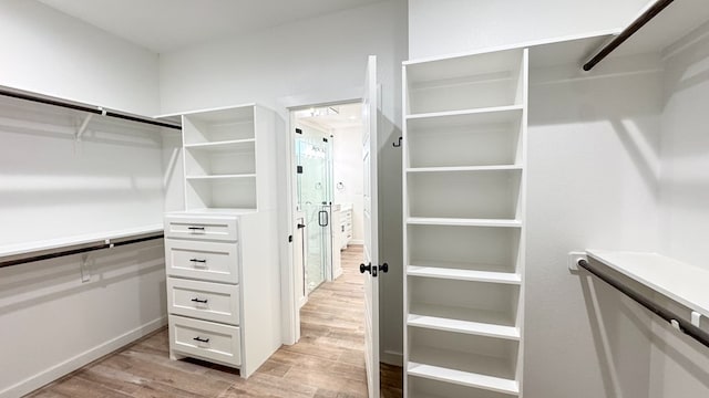 13223 E County Rd 110, Midland, TX 79706 - walk in closet with light wood-style flooring