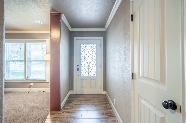 2205 Boyd Ave, Midland, TX 79705 - foyer entrance featuring a textured wall, a textured ceiling, crown molding, and dark wood-style flooring