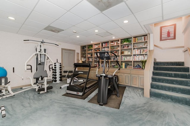 workout room with built in shelves, recessed lighting, and carpet flooring