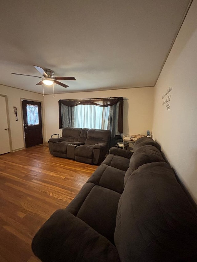 3103 Hill Ave, Snyder, TX 79549 - living room with wood finished floors and a ceiling fan