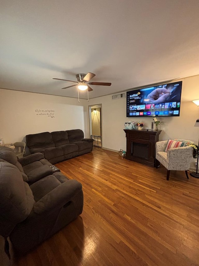 3103 Hill Ave, Snyder, TX 79549 - living room with wood finished floors and a ceiling fan