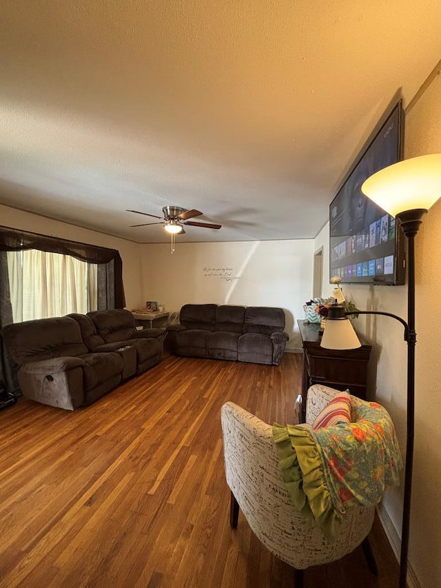 3103 Hill Ave, Snyder, TX 79549 - living room featuring wood finished floors and ceiling fan
