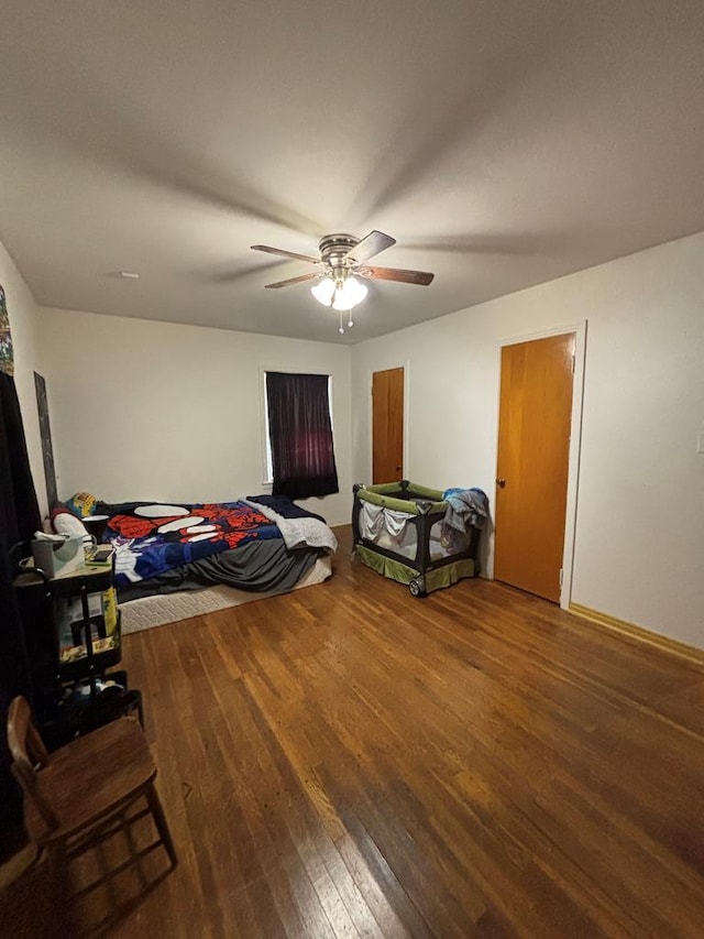 3103 Hill Ave, Snyder, TX 79549 - bedroom with hardwood / wood-style floors and a ceiling fan