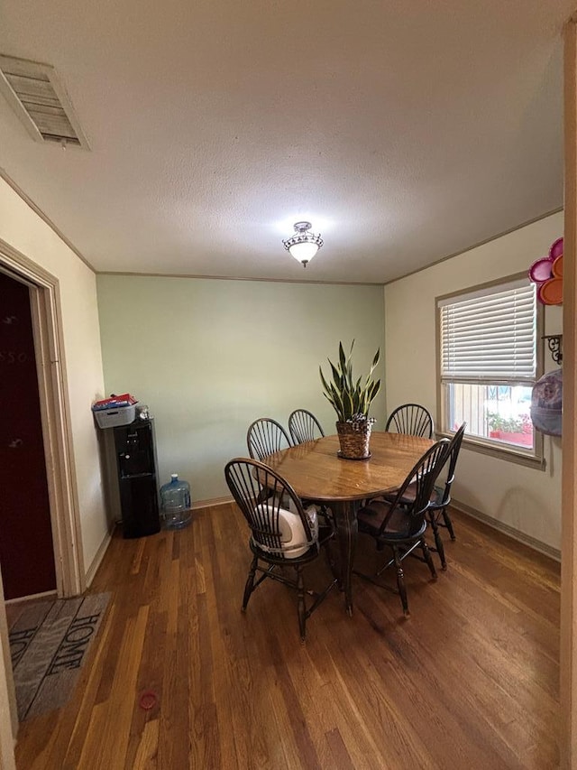 3103 Hill Ave, Snyder, TX 79549 - dining room featuring wood finished floors and baseboards