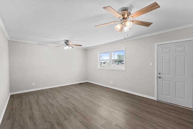 306 S Moss Lake Rd, Big Spring, TX 79720 - unfurnished room with a ceiling fan, dark wood finished floors, and ornamental molding