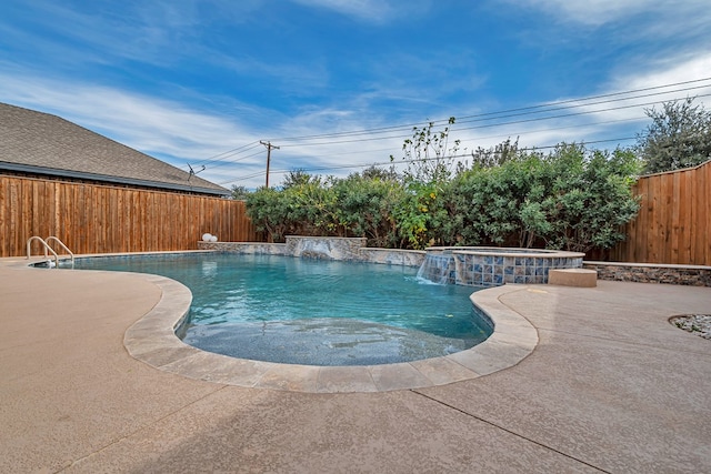 view of swimming pool with an in ground hot tub and a patio area