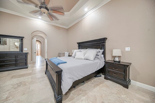 bedroom with ceiling fan and ornamental molding