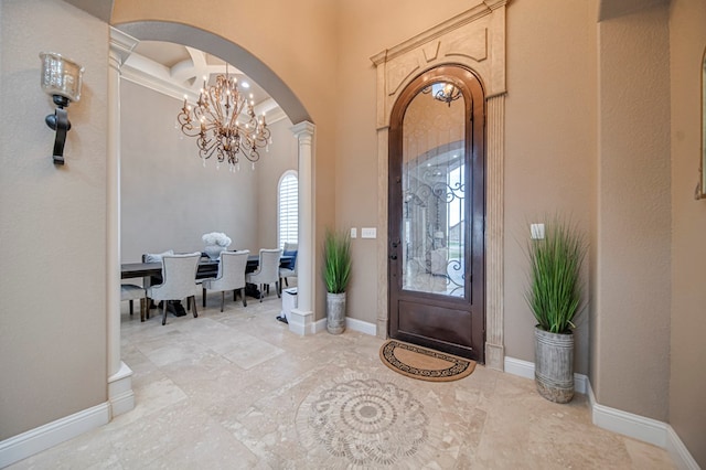 foyer with ornate columns