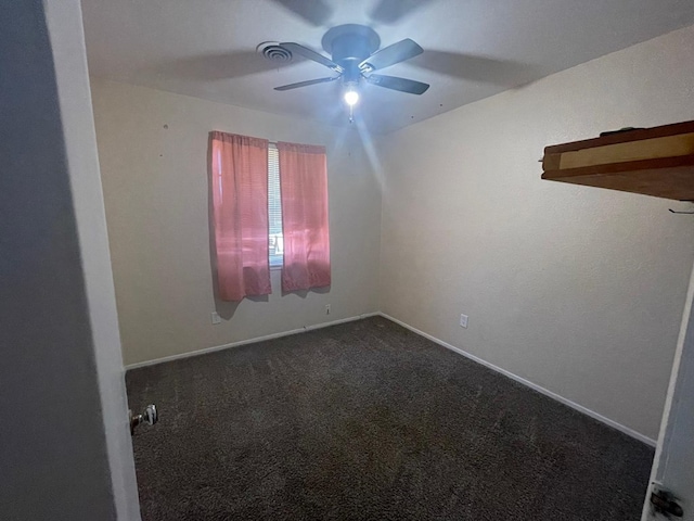 4705 Ric Dr, Midland, TX 79703 - empty room featuring ceiling fan, dark carpet, and baseboards