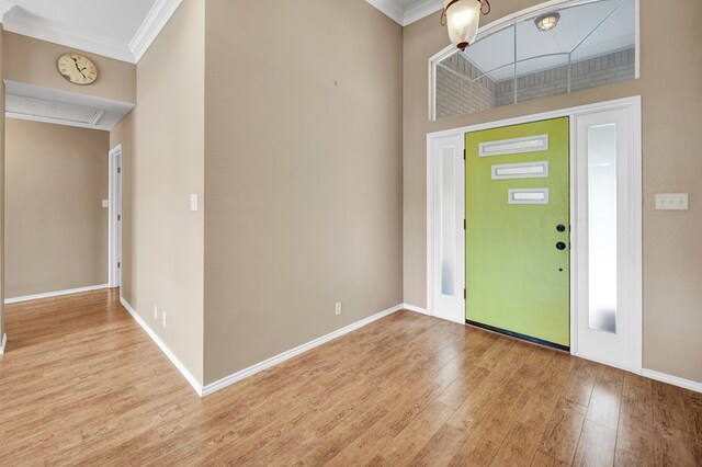5810 Sterling Pl, Midland, TX 79707 - entrance foyer featuring ornamental molding, wood finished floors, and baseboards