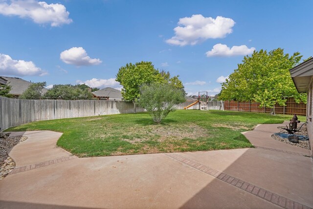5810 Sterling Pl, Midland, TX 79707 - view of yard featuring a playground and a patio area
