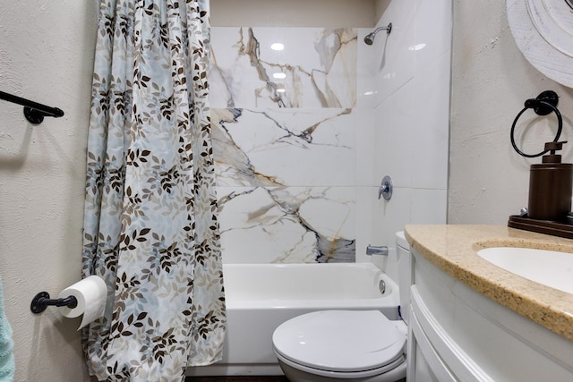 bathroom with a textured wall, toilet, shower / bath combination with curtain, and vanity