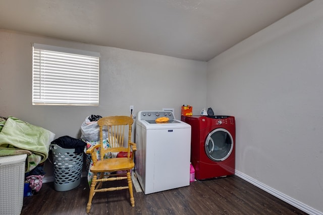 laundry room featuring washer and dryer, wood finished floors, laundry area, and baseboards