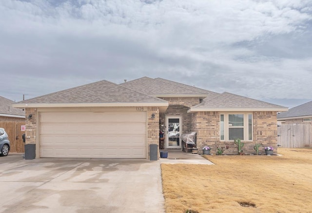 ranch-style home with a garage