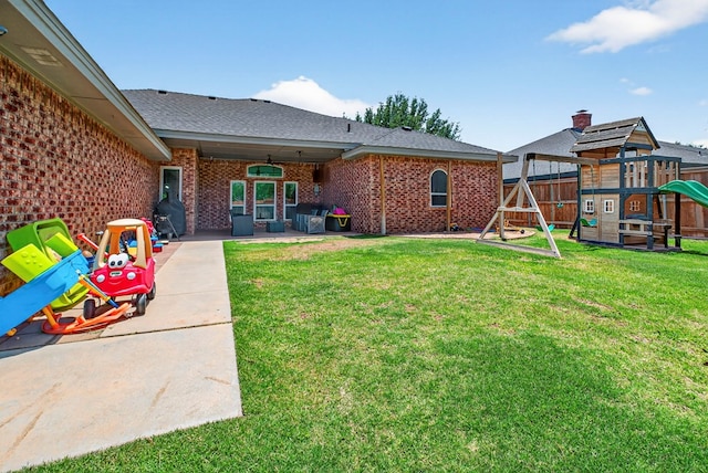 5604 Crowley Blvd, Midland, TX 79707 - view of yard featuring a playground and a patio area