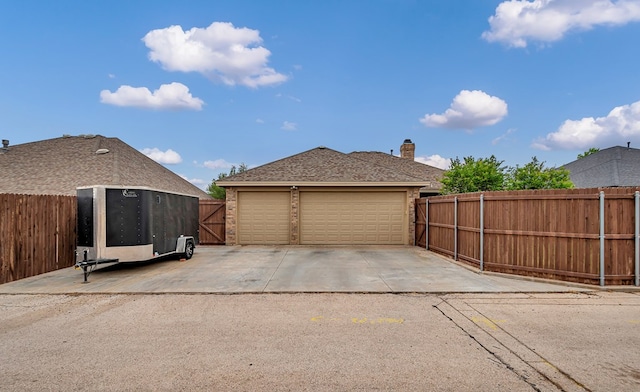 garage featuring fence