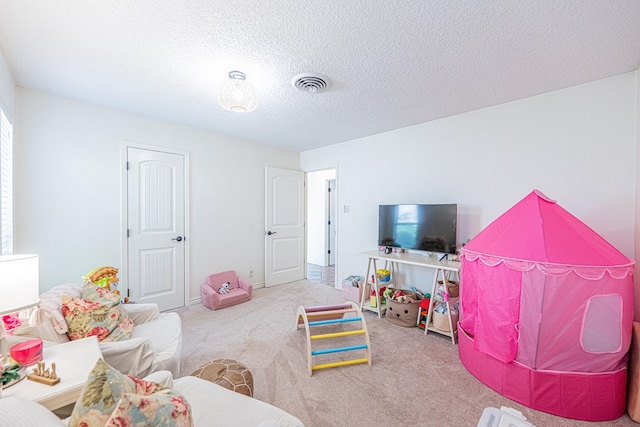3615 W Wadley Ave, Midland, TX 79707 - rec room featuring carpet floors and a textured ceiling