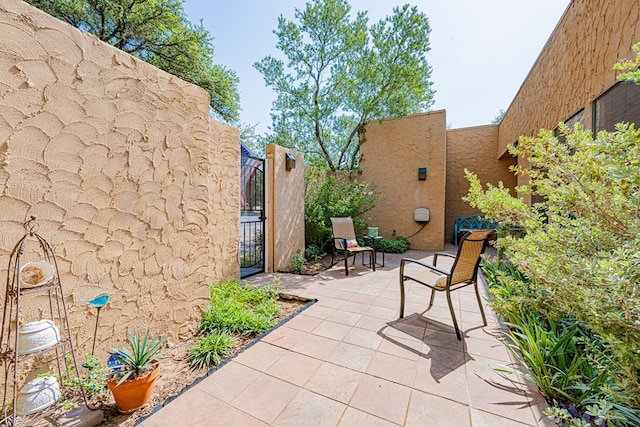 3615 W Wadley Ave, Midland, TX 79707 - view of patio featuring a gate
